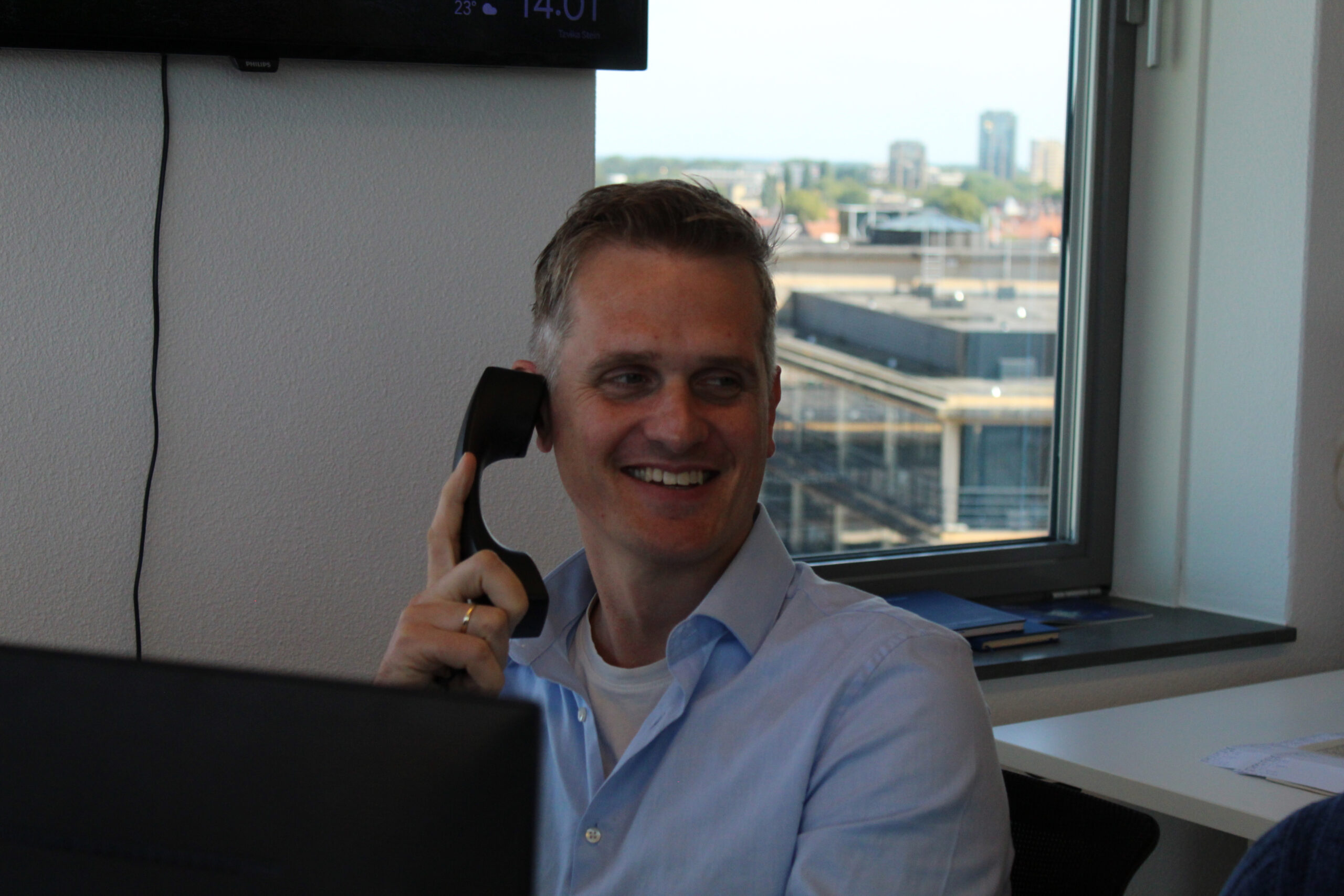 Bluem team member on a phone call